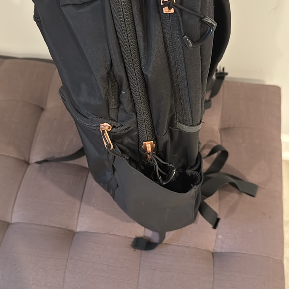 black north face backpack with rose gold zipper Women's Electra in and by The Black the Borealis Luxe Backpack keeps up with your day and looks good doing it The North Face Women's Surge